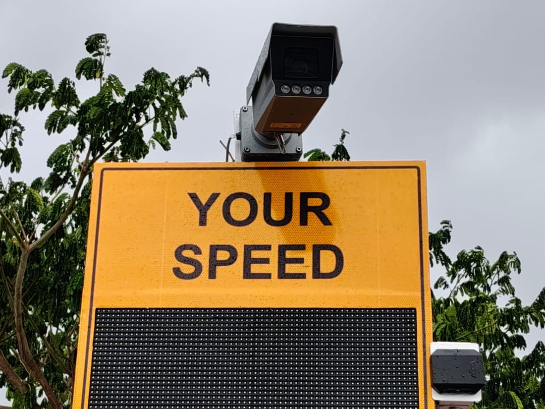 4MP ANPR enforcement camera mounted on a mast arm above a radar speed display, with an over-speed beacon and the radar sensor either side